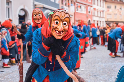 Portrait of people standing on street