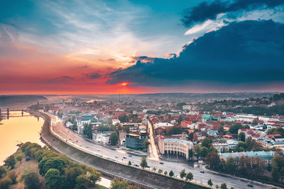 High angle view of buildings against sky during sunset