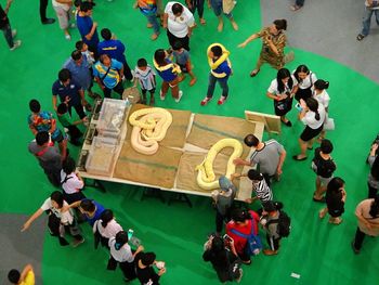 High angle view of people on table