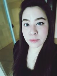 Close-up portrait of young woman