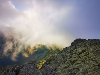 Scenic view of volcanic mountain against sky