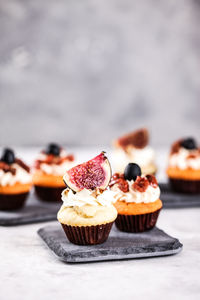 Close-up of cup cakes on table