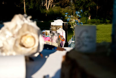 Close-up of cross on table at cemetery