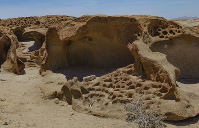 Rock formations in desert against sky