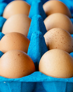 Full frame shot of eggs in carton