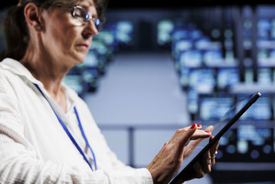 Young woman using phone