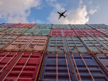 Low angle view of airplane flying in sky