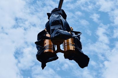 Low angle view of statue against sky