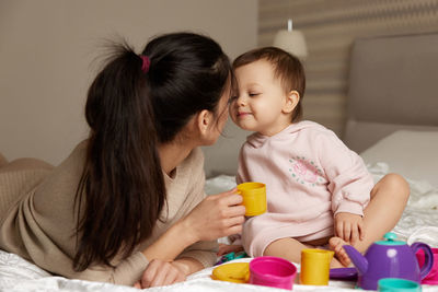 Mother and daughter at home