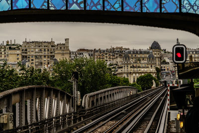 Railroad track passing through city