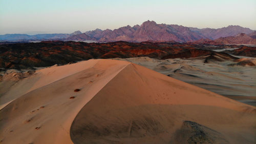 Scenic view of desert against sky
