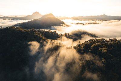 Scenic view of mountains against sky during sunset