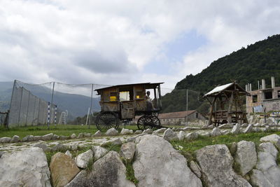 Built structure on land against sky