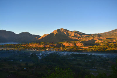 Morning panoramic view of pergasingan hill, mount rinjani national park