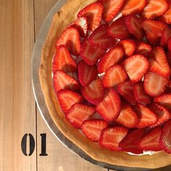 Directly above shot of strawberry tart on table
