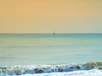 Scenic view of sea at sunset