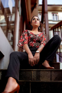 Young woman sitting on seat