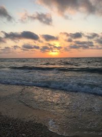 Scenic view of sea against sky during sunset