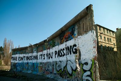 Low angle view of graffiti on wall