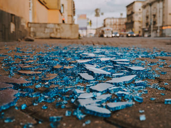 Surface level of broken glass on footpath