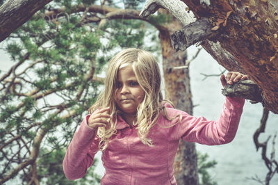 Portrait of girl in tree