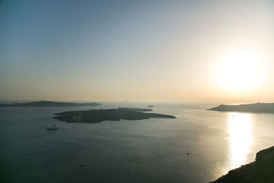 Scenic view of sea against clear sky during sunset