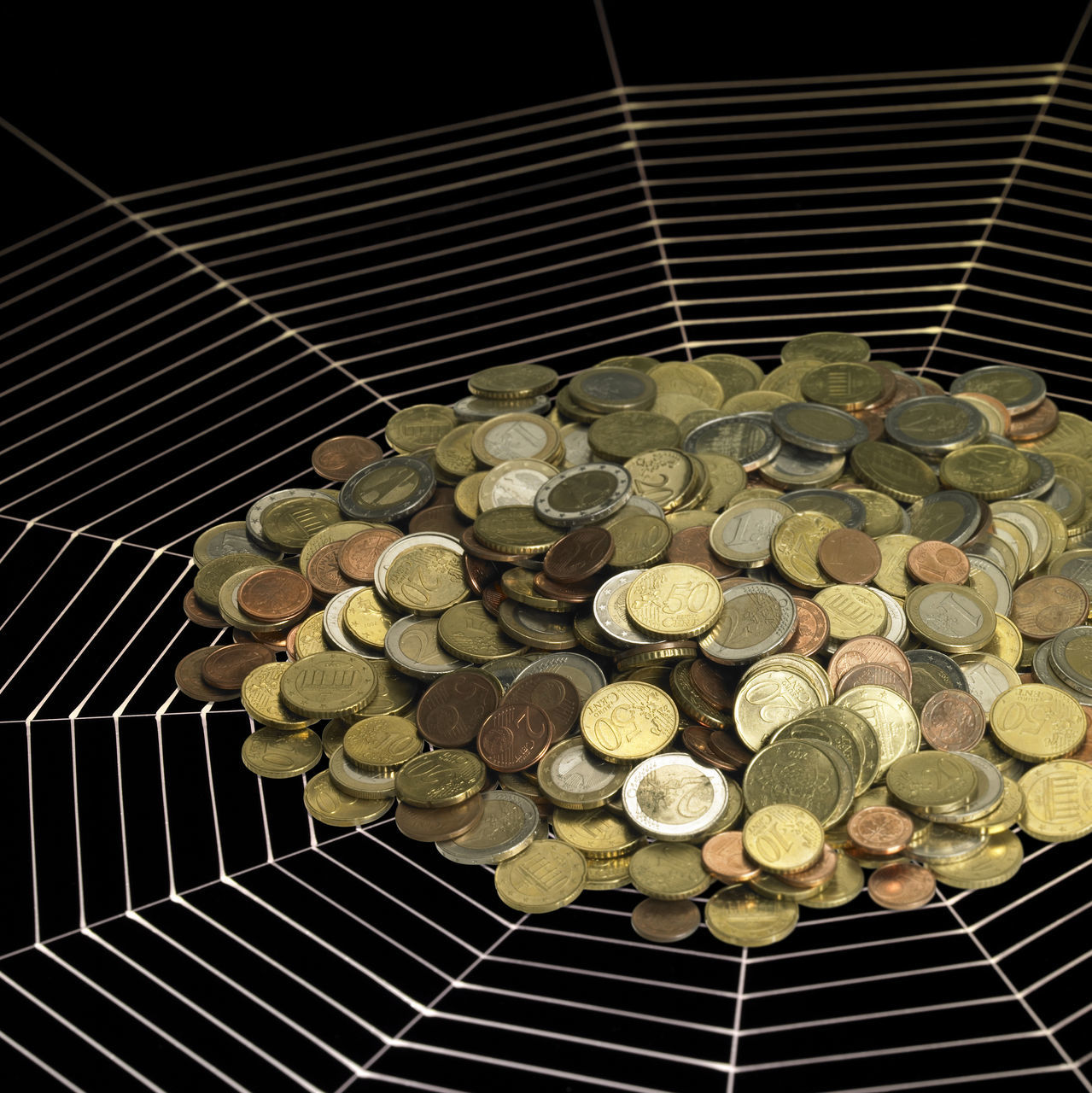 HIGH ANGLE VIEW OF COINS ON BARBECUE