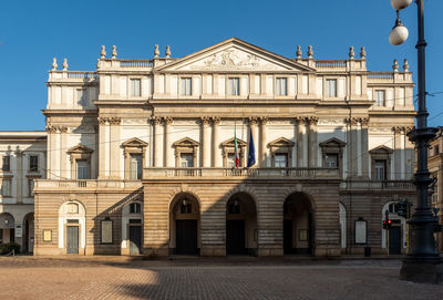 Milan 07-25-2020teatro alla scala is the main opera house in milan. behind a blue summer sky