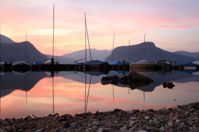 Scenic view of lake at sunset
