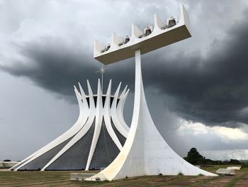 Built structure against cloudy sky