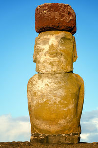 Pukao statue at rapa nui national park against sky