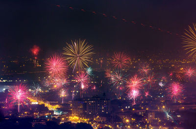 Firework display at night
