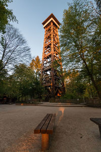 Low angle view of tower in park against sky