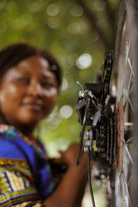 Portrait of young woman using mobile phone