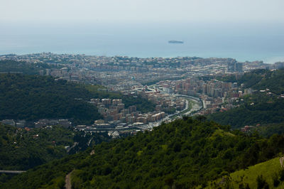 High angle view of buildings in city against sky