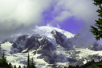 Scenic view of tree mountains against sky