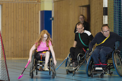 Disabled people playing in gym