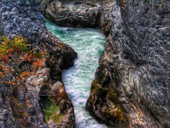 High angle view of rocks by sea