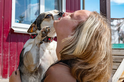 Close-up of woman with dog