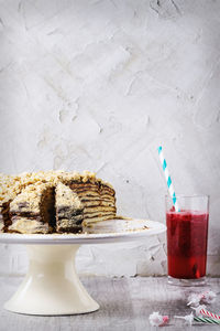 Close-up of cake and drink on table