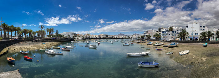 High angle view of boats moored at harbor