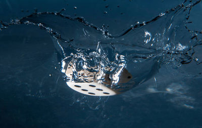 Dice droped into water 