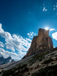 Low angle view of rock formation against sky