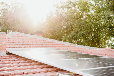 Solar panels on roof during sunrise.renewable energies and green energy concept. nobody