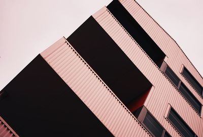 Low angle view of modern building against clear sky