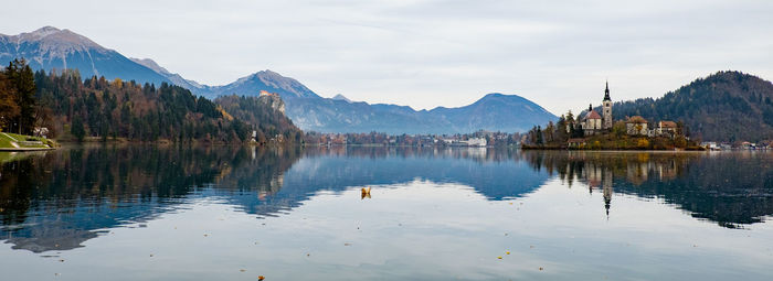 Scenic view of lake bled with mountains reflection