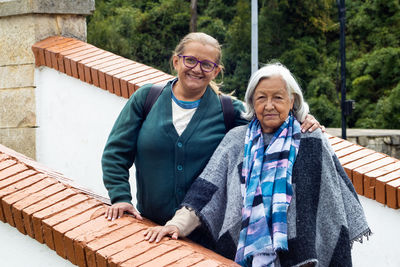 Group of women travelling. famous historic bridge of boyaca in colombia. colombian independence .