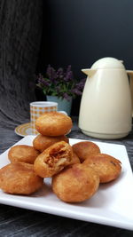 Close-up of breakfast in plate on table