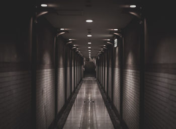 Illuminated corridor of building