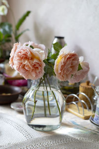 Close-up of rose bouquet on glass table